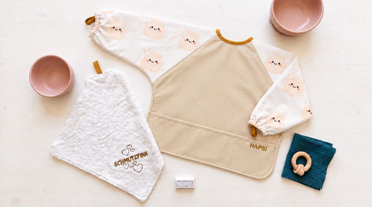 Inhalt der Box Klecksi Beige mit Schale und Beißring dekoriert